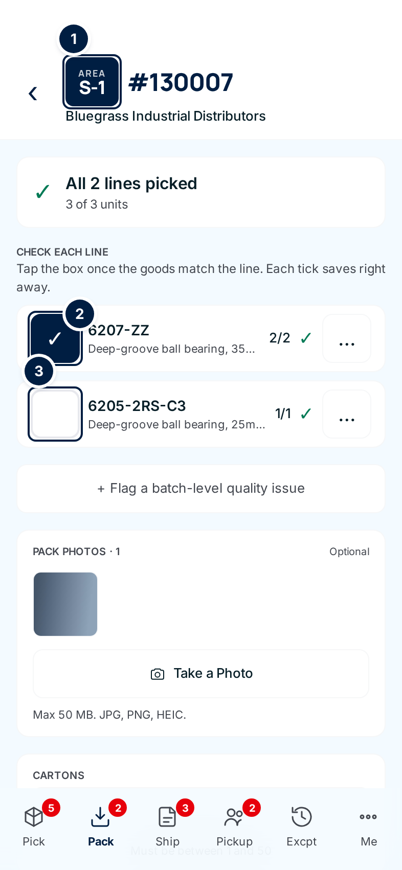 The pack screen for order 130007 in area S-1: the first line ticked, the second not yet